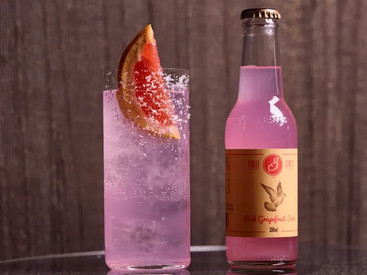 Three Cents pink grapefruit soda met serve